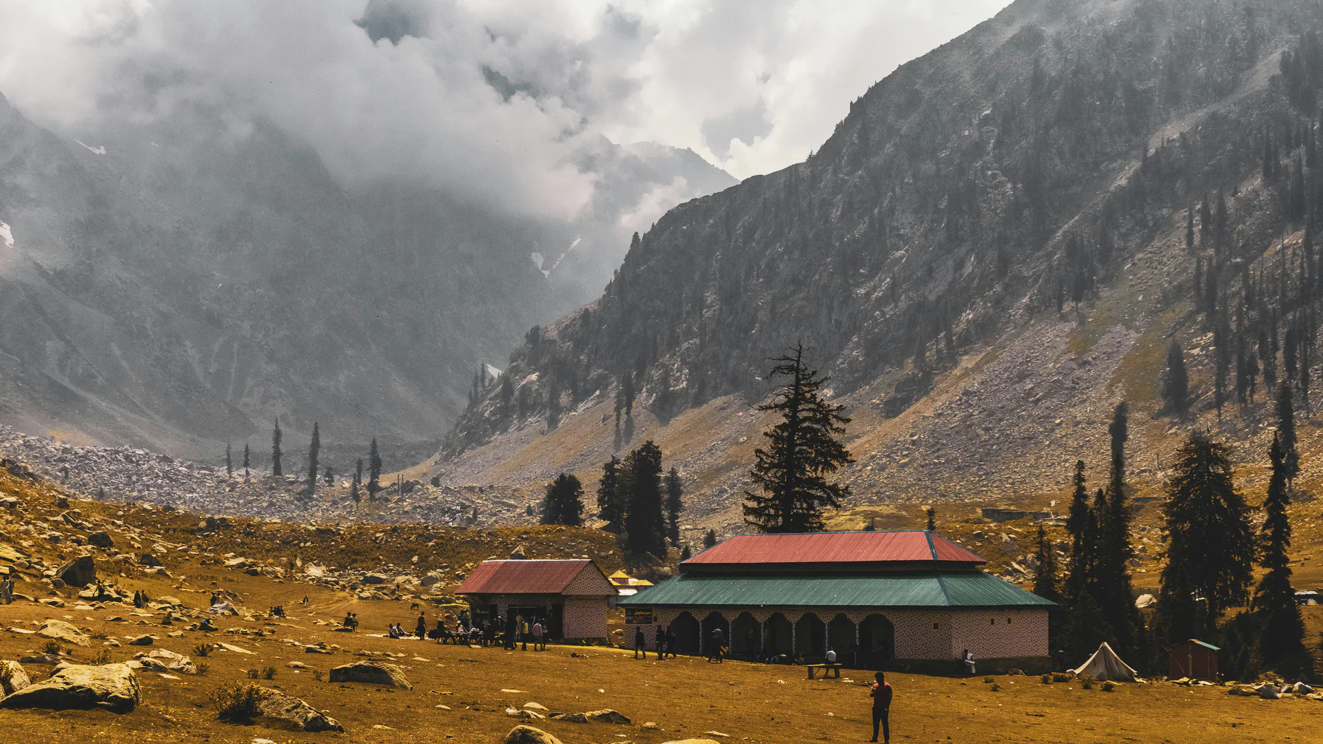 The high green meadow and mountain amphitheatre of Jahaz Banda in Upper Dir