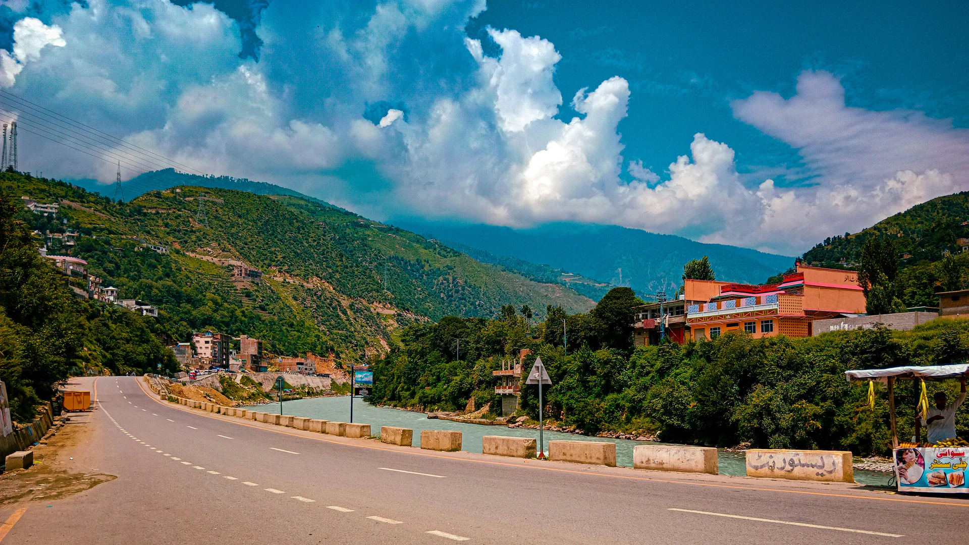 A mountain road entering the green hills of Madyan in Swat Valley